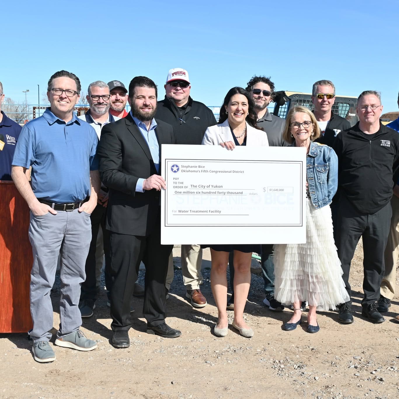 Mayor Brian Pillmore, Congresswoman Stephanie Bice and city staff holding an oversized cheque for $1,640,000 made out to the City of Yukon for the water treatment facility