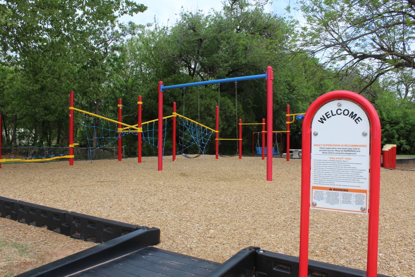 Bledsoe Park playground — obstacle course climbing structure