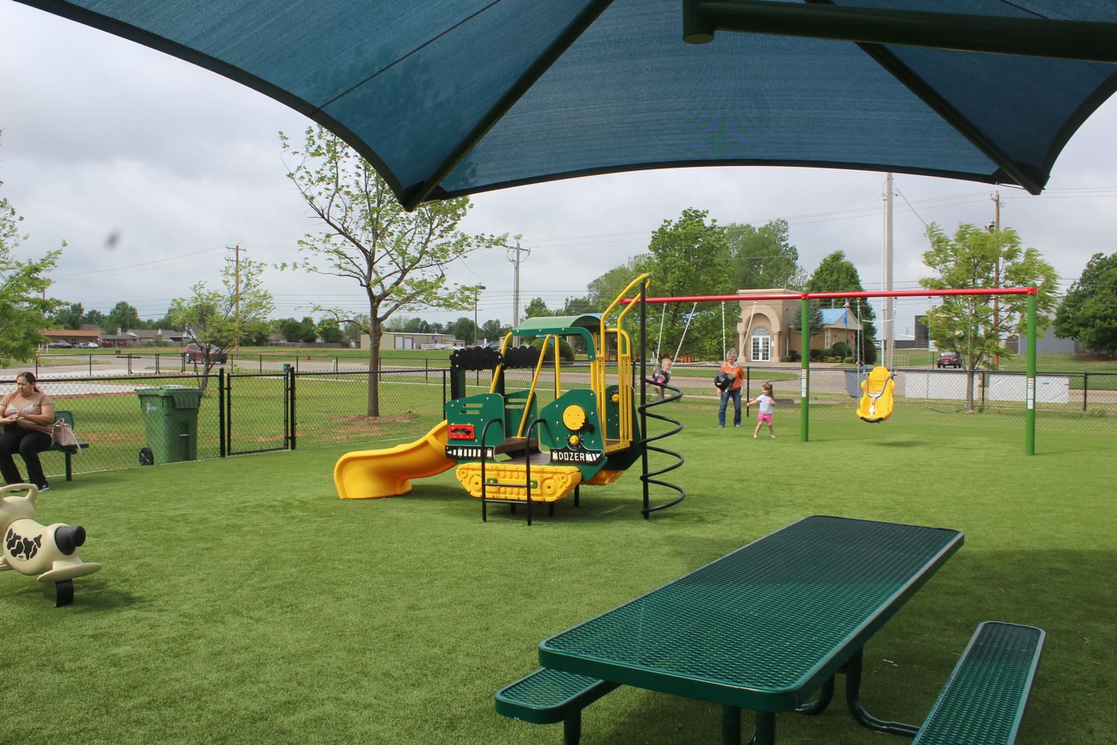 Lawn at the Library — turfed and shade-covered play area