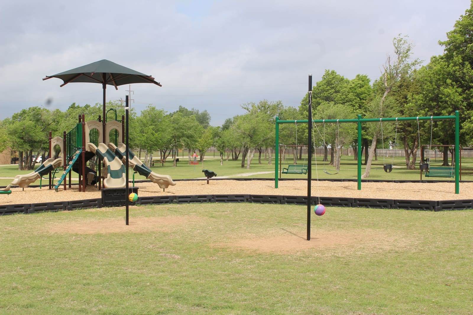 Welch Park playground — swings and seesaws
